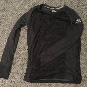 dark grey umbro under shirt, barley worn